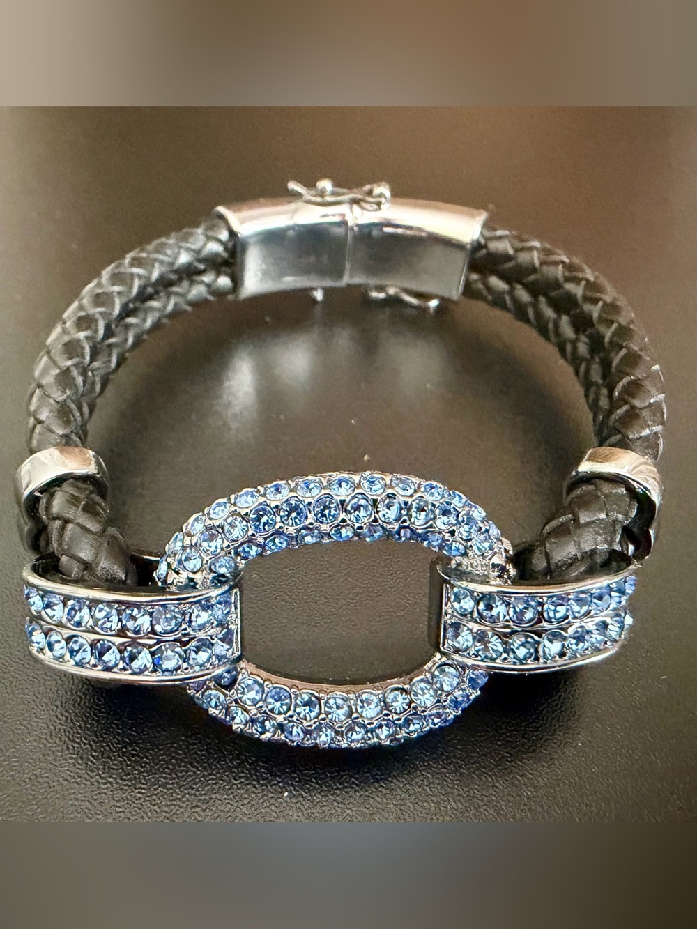 JOAN BOYCE BRAIDED BLACK LEATHER CORD BRACELET WITH PR BLUE PAVE CRYSTALS